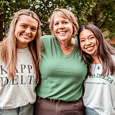 Three women smiling. Links to Gift Options