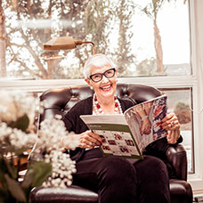 A woman smiling. Links to Gifts by Will