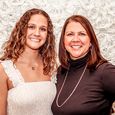 Two women smiling. Links to Donor-Advised Funds