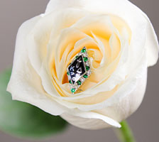 White rose and badge. Link to Life Stage Gift Planner Under Age 45 Gifts.