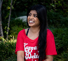 Woman smiling. Links to Gifts That Protect Your Assets