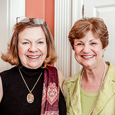 Two women smiling. Links to Gifts from Retirement Plans